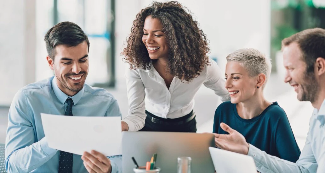 A finance team reviewing intercompany transactions together